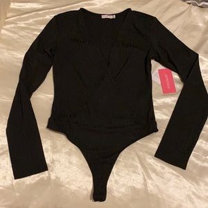 Deep V cut Ribbed Bodysuit
